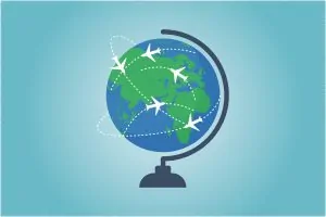 Globo terrestre mostrando diversos aviões realizando frete internacional